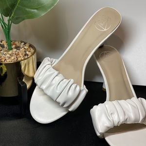 white faux leather ruched mid heel mules